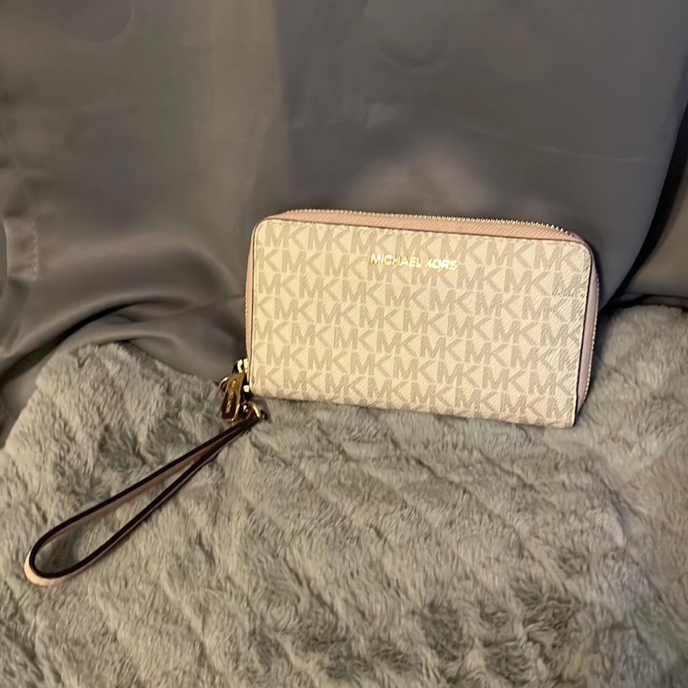 Pink white gold Michael Kors wristlet